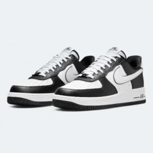Nike Air Force 1 '07 LV8 Panda' – a sleek black-and-white sneaker featuring premium leather, bold contrast, and signature AF1 cushioning.