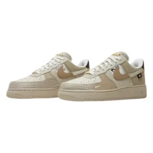 "Nike Air Force 1 '07 LX 'Tan Bling' – premium tan sneakers featuring a patchwork-style upper with mesh, leather, and metallic gold accents.