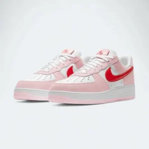 Nike Air Force 1 '07 QS Valentine's Day Love Letter' featuring a soft pink and red leather upper, heart-shaped perforations, and embroidered love-themed details.