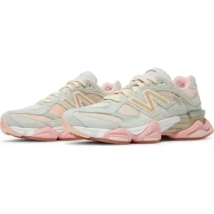 "New Balance 9060 Baby Shower Blue featuring Baby Shower Blue suede overlays, gold New Balance branding, and a chunky ABZORB-cushioned sole