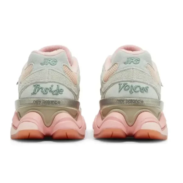 Back view of the New Balance 9060 Baby Shower Blue, showcasing the padded heel collar, sculpted ABZORB-cushioned sole, and gold New Balance branding