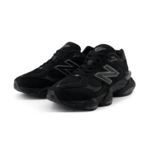New Balance 9060 Triple Black featuring black suede overlays, mesh underlays, sculpted ABZORB-cushioned sole, and tonal 'N' branding